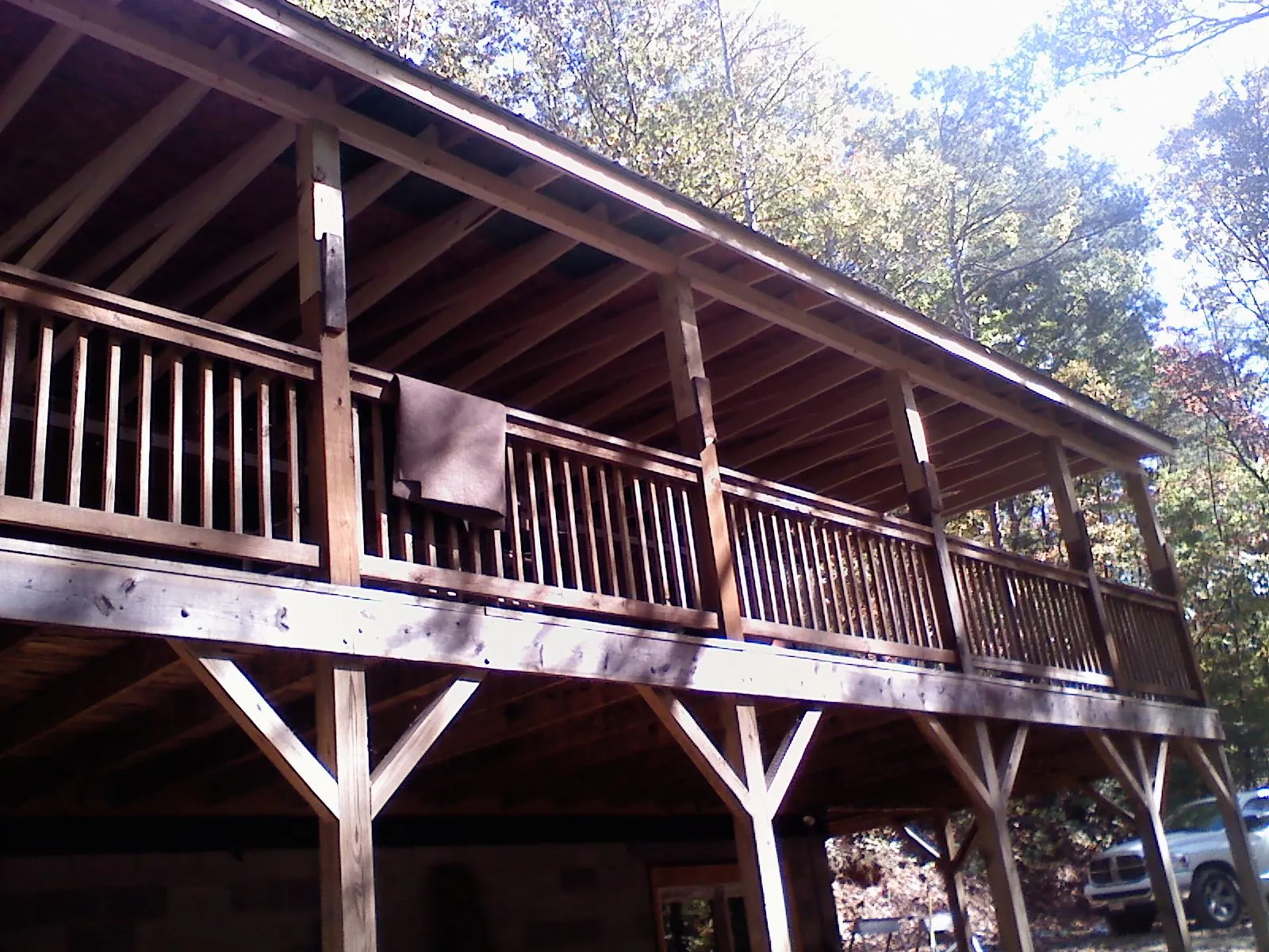 Timber framing under a new elevated porch and deck — Roof Leak Repair in Ruthville by Roofing Brothers